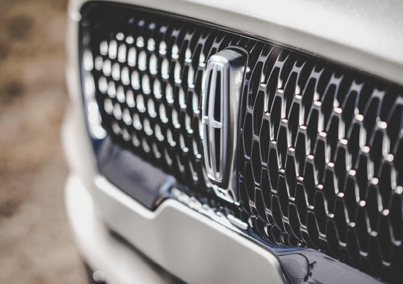 The grille of the 2024 Lincoln Aviator® Reserve model with an eye-catching repeated field of Lincoln Star logo shapes | Oliver Lincoln in Plymouth IN