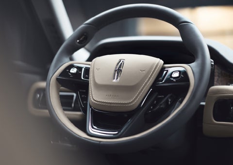 The intuitively placed controls of the steering wheel on a 2024 Lincoln Aviator® SUV | Oliver Lincoln in Plymouth IN