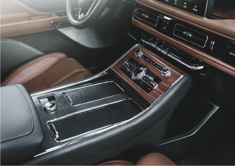 The front center console of a 2023 Lincoln Aviator® SUV is shown | Oliver Lincoln in Plymouth IN
