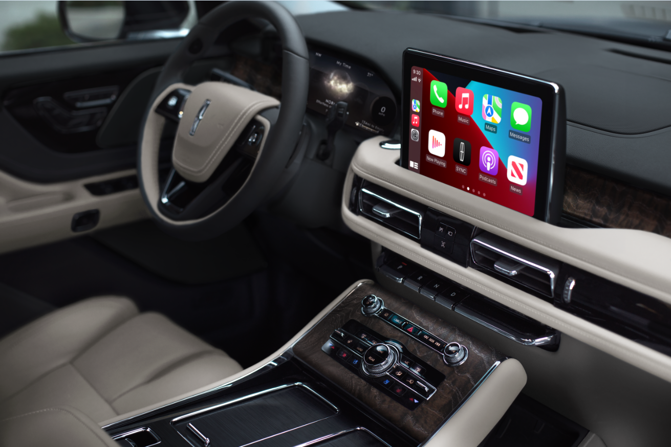The interior of a Lincoln Aviator® SUV is shown with emphasis on the center touchscreen | Oliver Lincoln in Plymouth IN