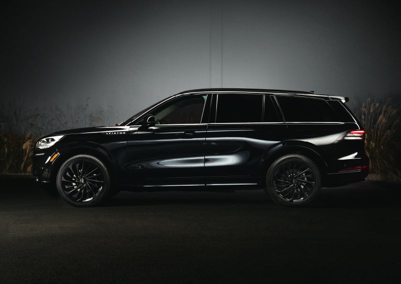 A 2024 Lincoln Aviator® SUV is shown in the Infinite Black exterior color | Oliver Lincoln in Plymouth IN