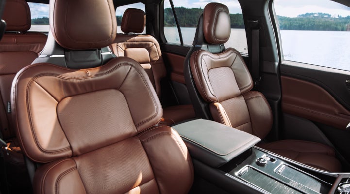 The front row's Perfect Position Seats in a 2024 Lincoln Aviator® Reserve model with Ebony Roast interior | Oliver Lincoln in Plymouth IN
