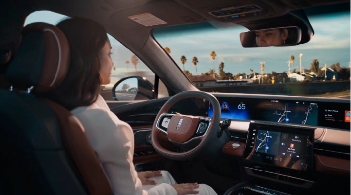 A person is shown driving hands-free on the highway with available Lincoln BlueCruise technology. | Oliver Lincoln in Plymouth IN